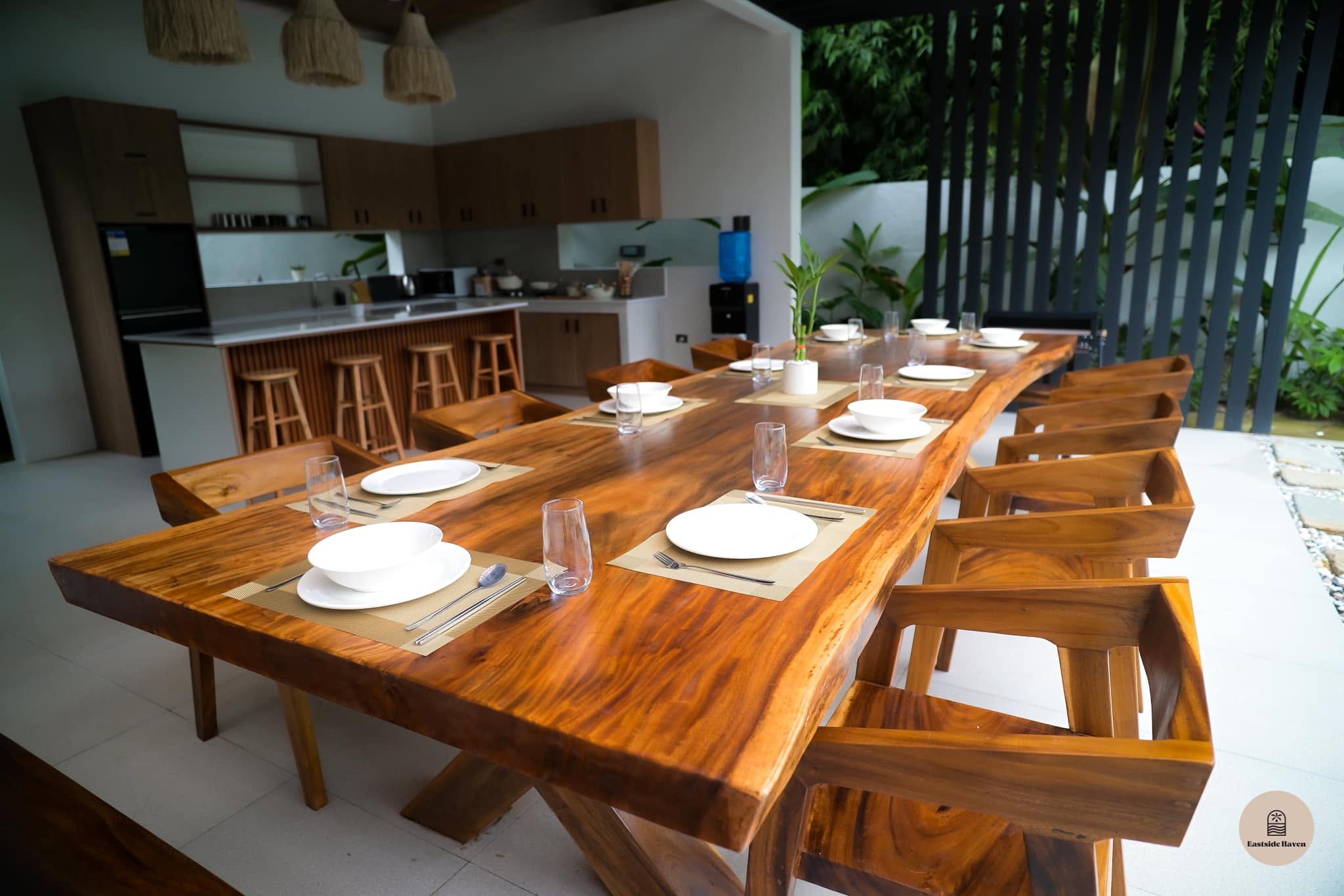 Long communal dining table set for a group