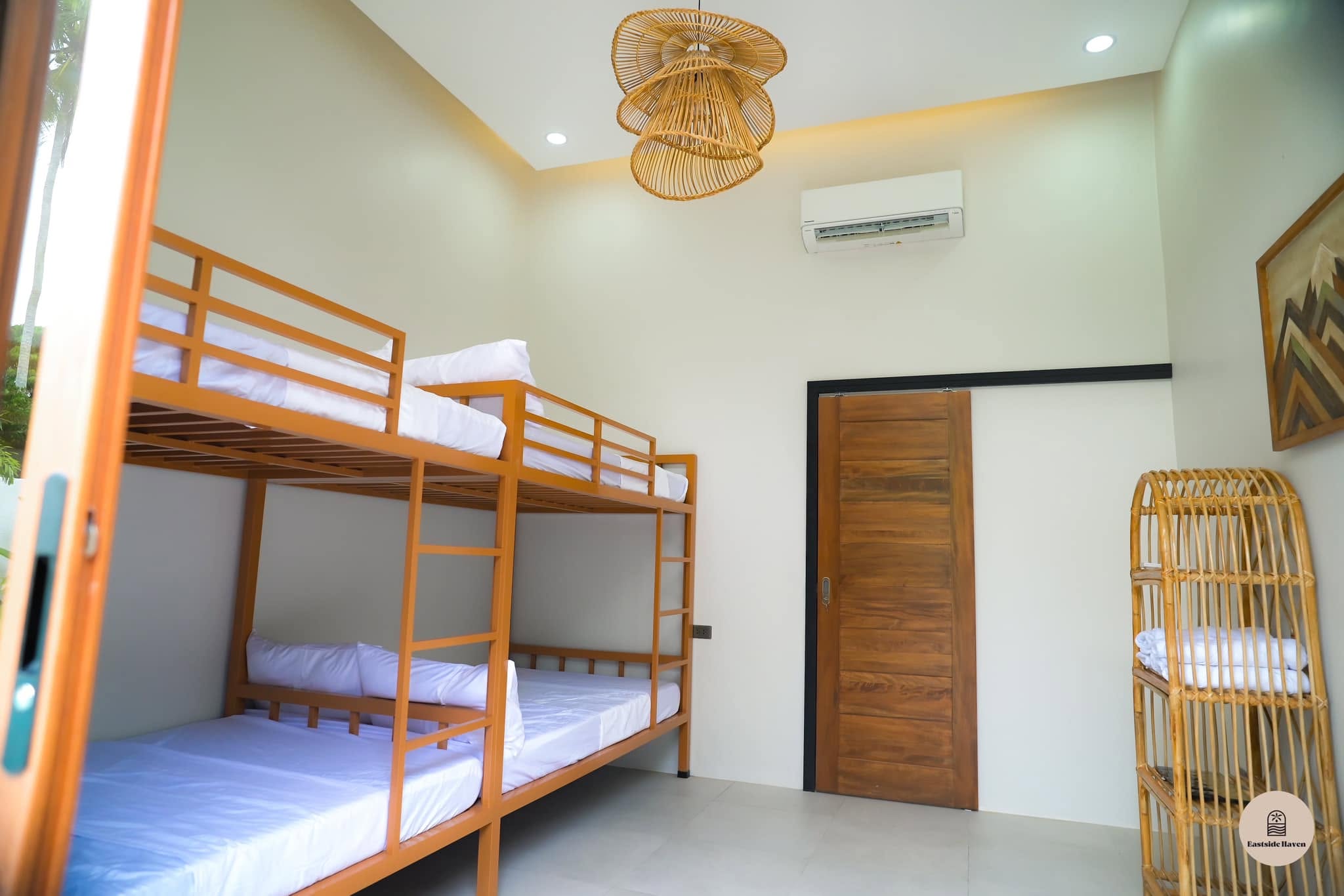 Bunk room with two sets of bunk beds
