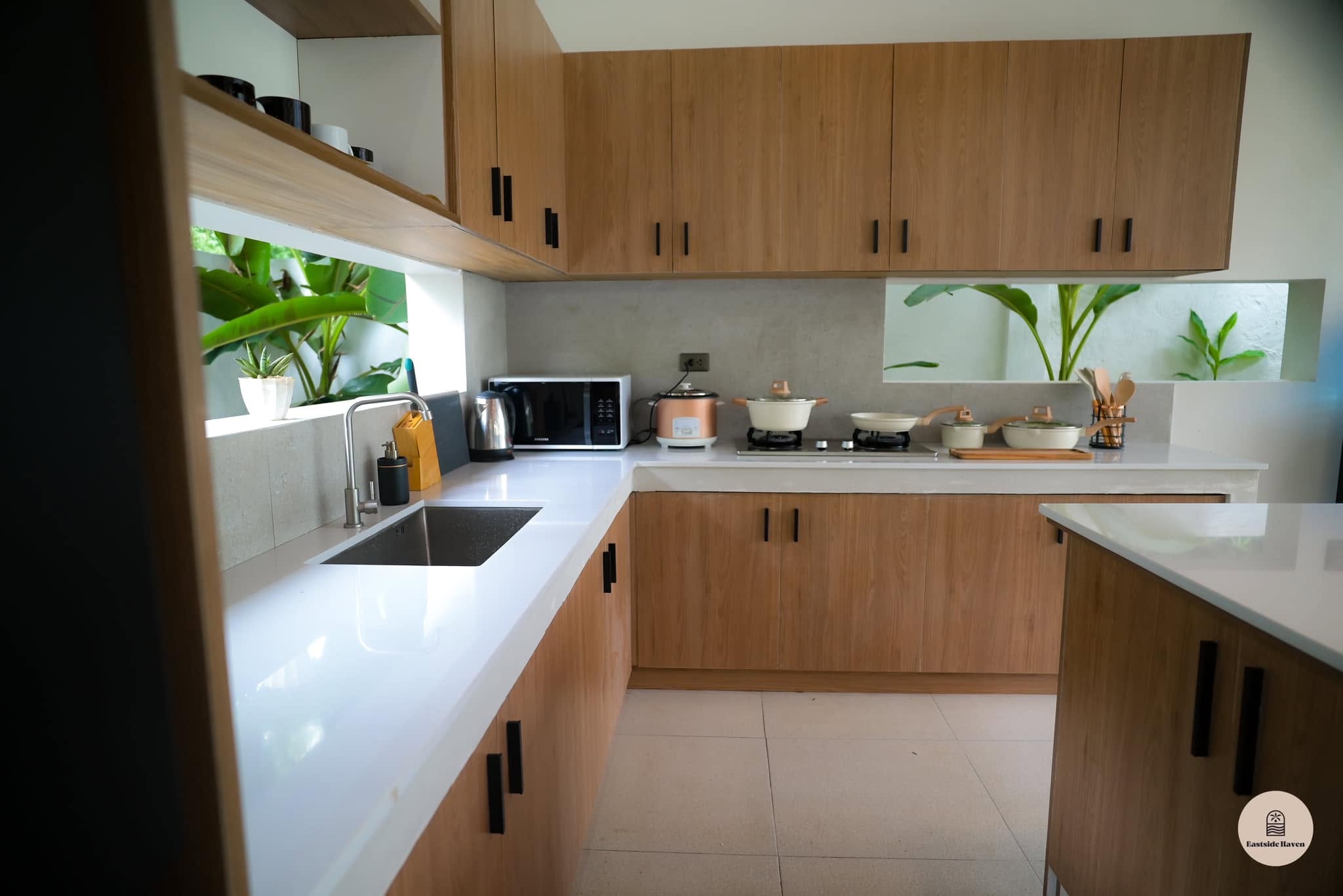 Kitchen counter with stove and sink